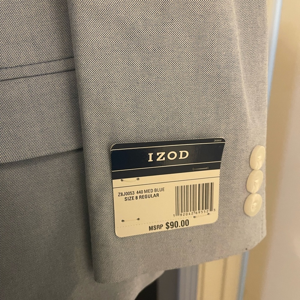 Boys two piece suit. Nwt. Blue blazer and white pants. Size 8. Izod